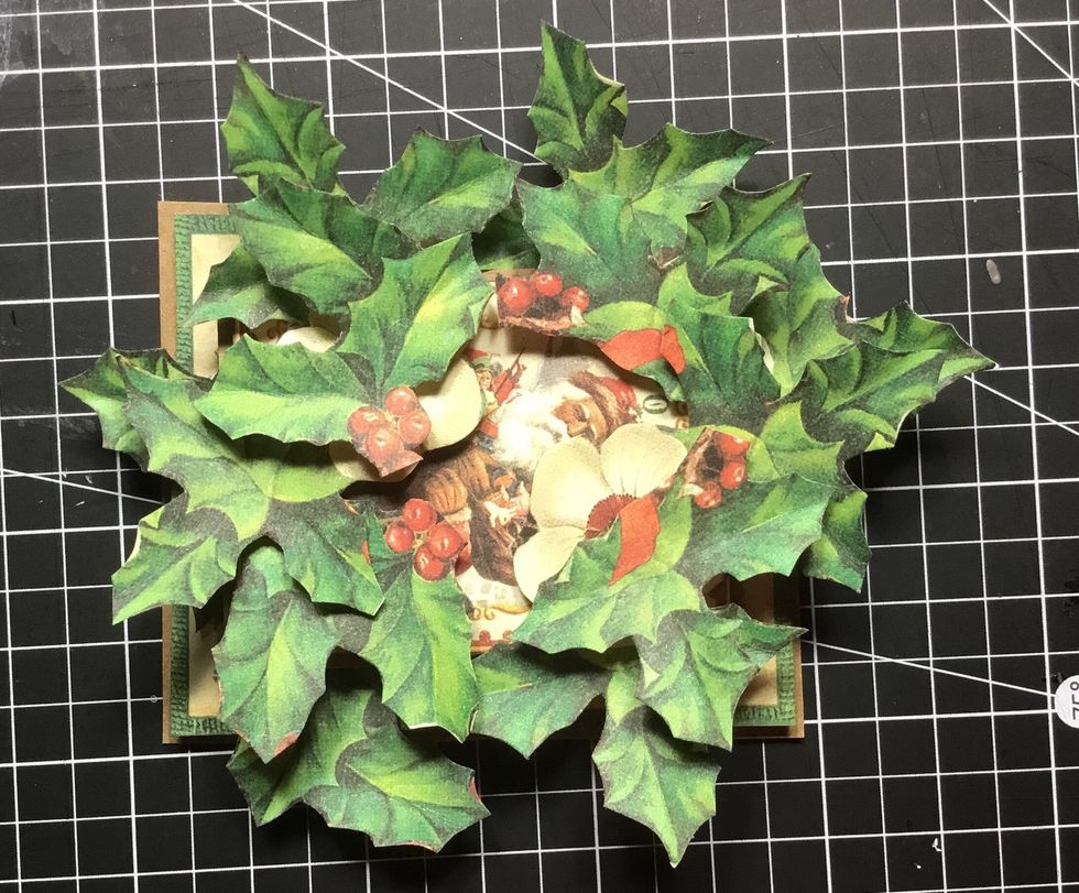 And now layer more holly leaves.