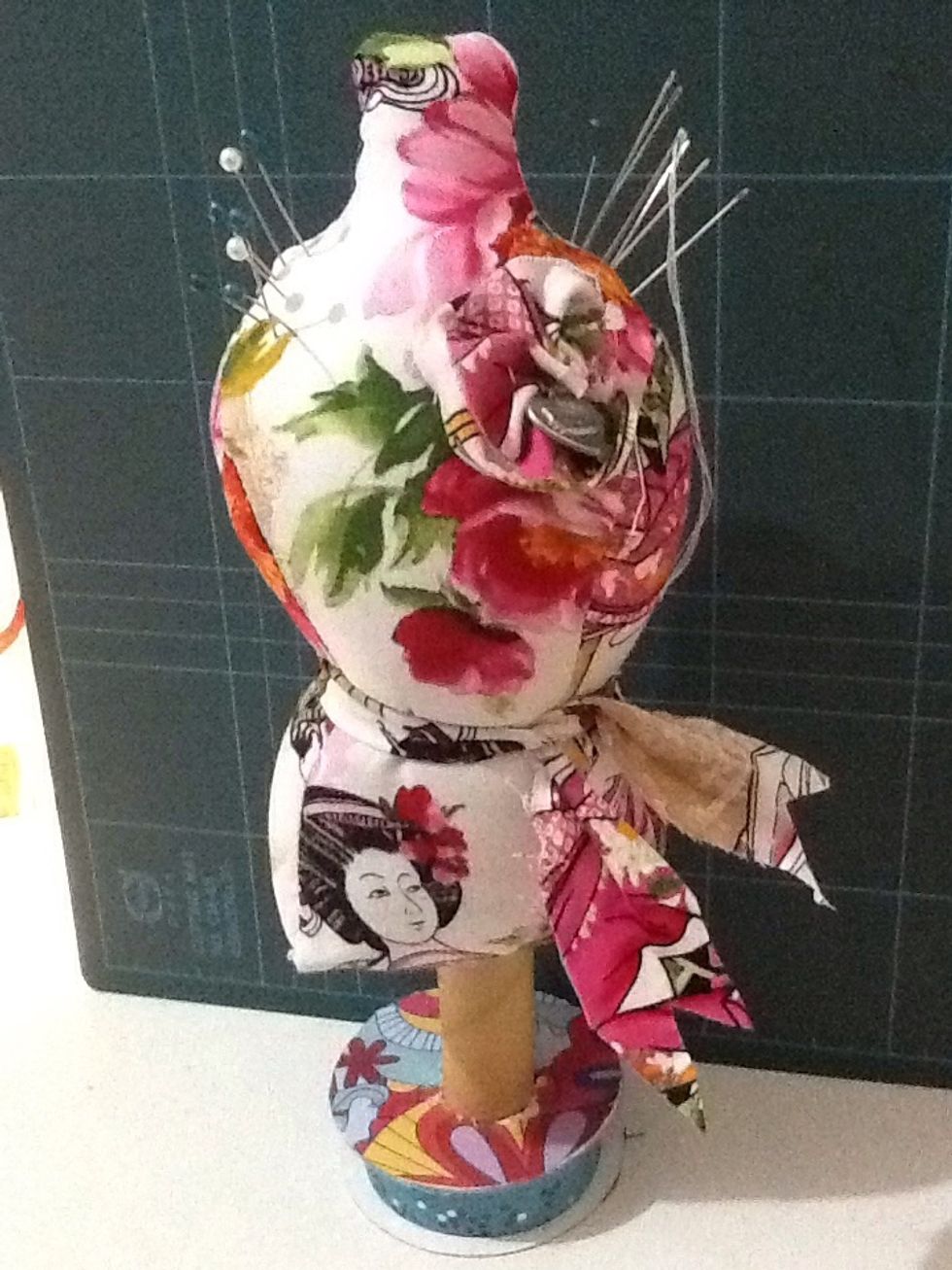 And now you're done! A super cute gift idea that is easy to make! You can decorate it any way you like now! I love this part! I added a scrap fabric flower to the chest, and a scrap fabric belt.