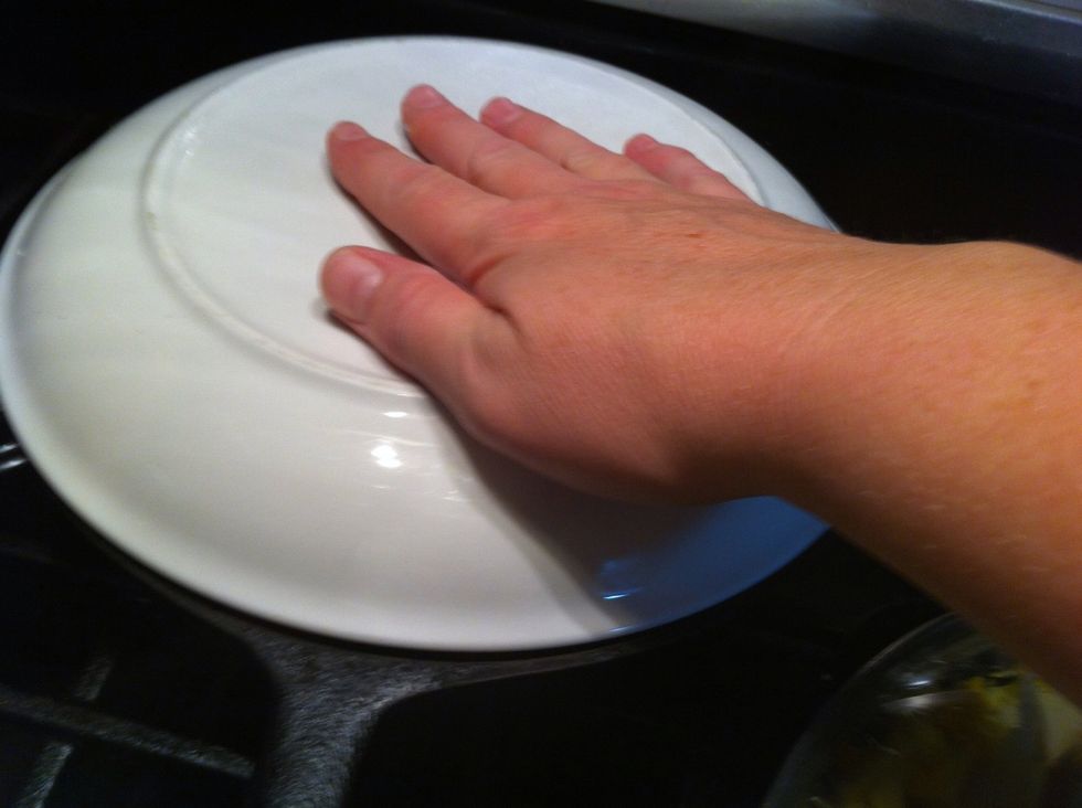 ...and one hand on the plate.. Flip over onto the plate.