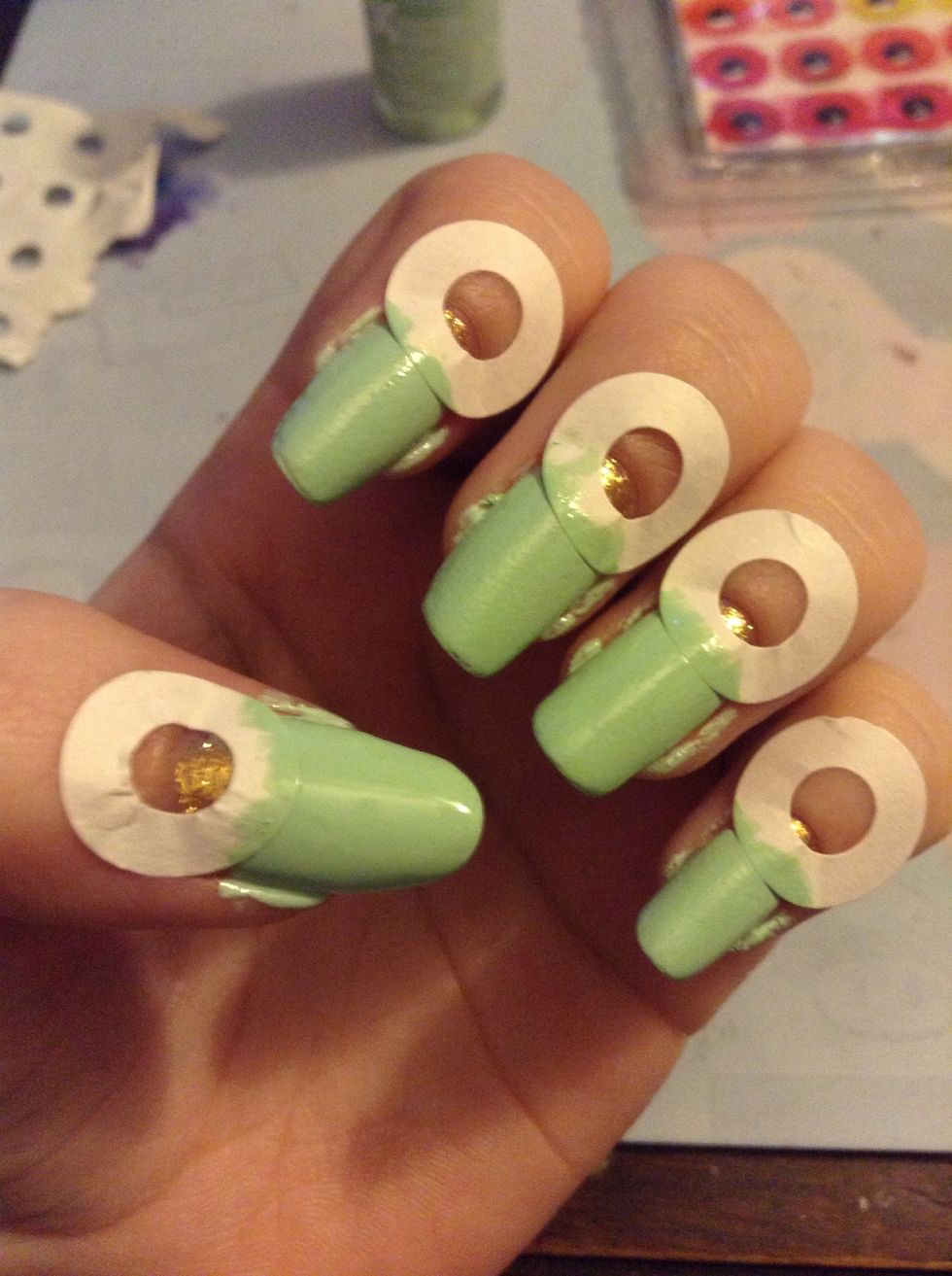 And paint one or two coats of your second polish. Some people peel off the stickers immediately after painting, I wait about ten minutes. Then peel them off.