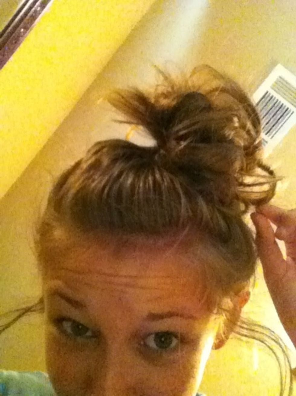And pin 1 side of the bun to your hair
