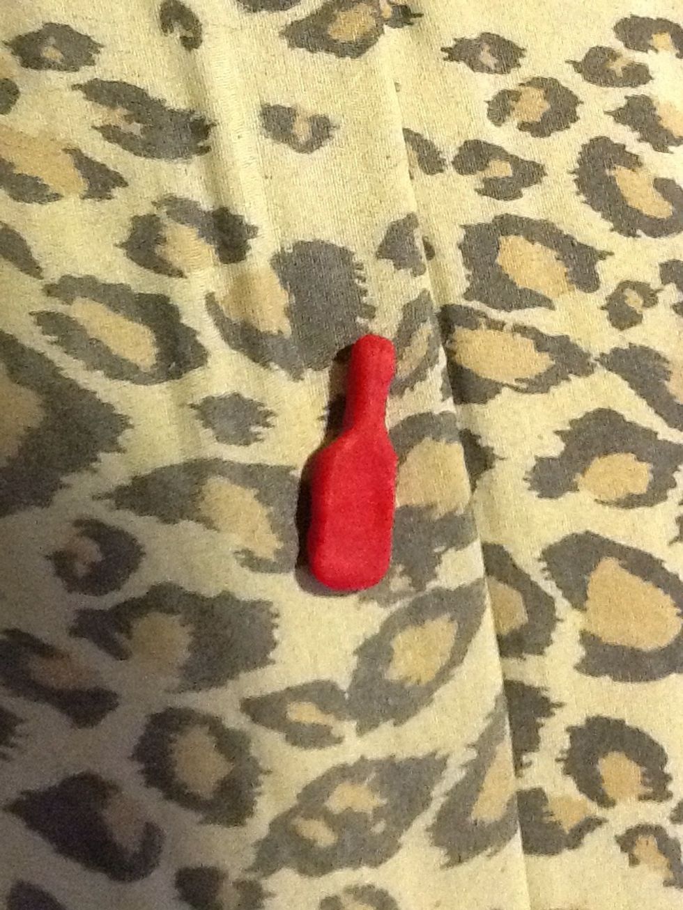 and pinch the top of it into a narrower rectangle, for the neck