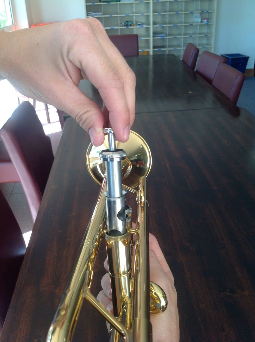 And place carefully in with the number toward the mouthpiece.