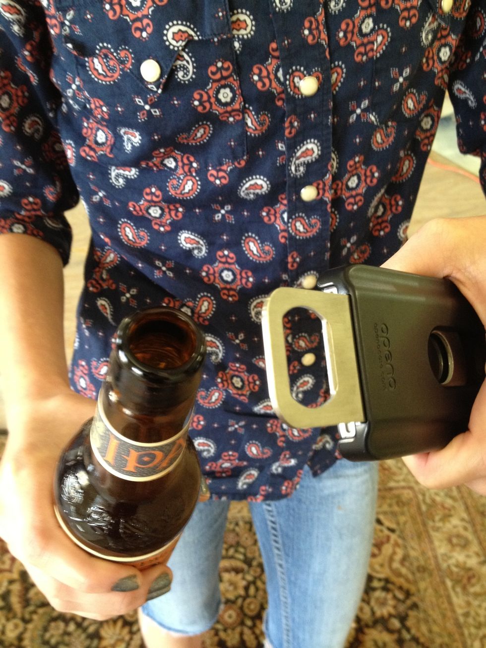 And pop. She calls it an Opena Case! You need to thank her for being an Apple-centric Kickstarter backer, and a dedicated eTech Parts customer.....And then ask her to stay for the movie.