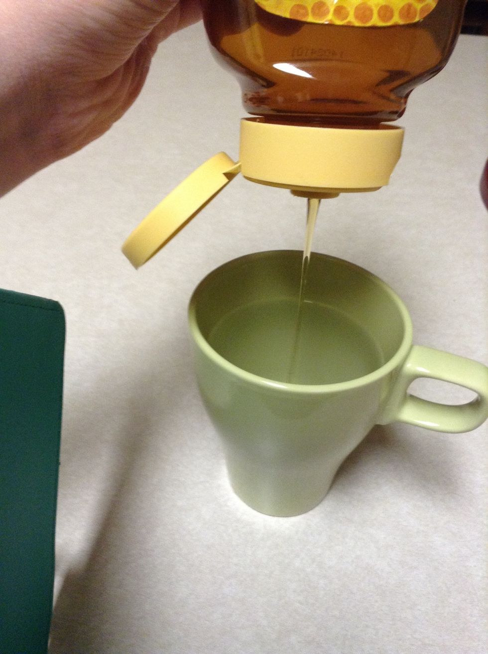 and pour about a teaspoon of honey in the hot water. just eye-ball it;)