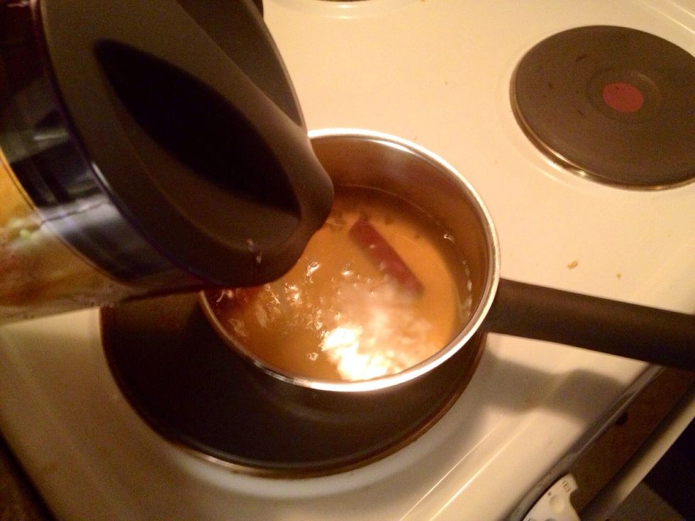 ..and pour the juice into the pot with the syrup.