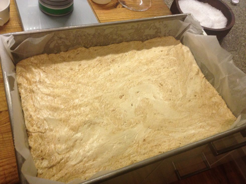 And press the peanut butter nougat into the tray