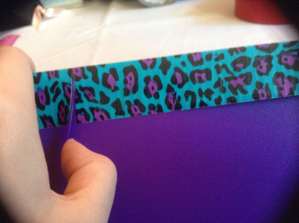 And press the tape down, making sure not to tape the pocket closed.