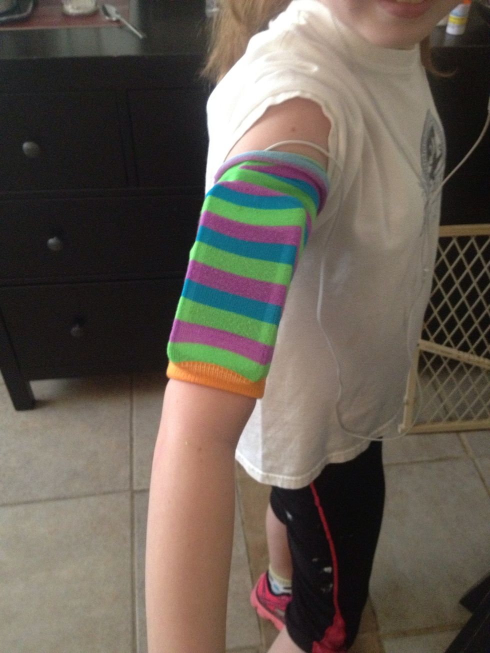 And pull sock over the top, so that it's now right-side-out and cuff is on the bottom