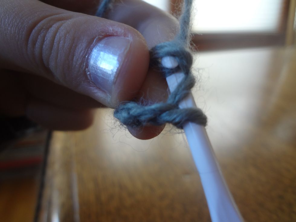 And pull the yarn through one stitch.