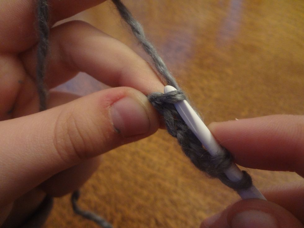And push it through the first stitch you made.