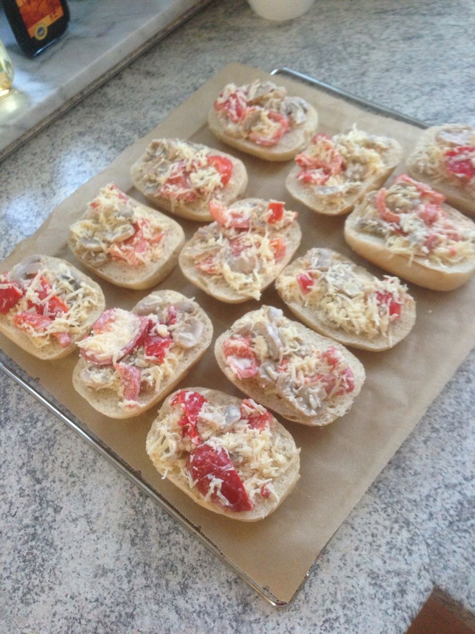 And put 1-2 Tablespoons of your mixture on it. Then put them into the Oven until their light brown.