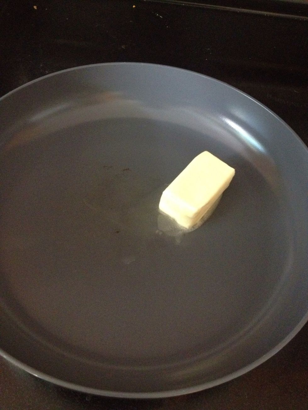 and put it into a frypan. Turn your heat to medium and get the butter melted.