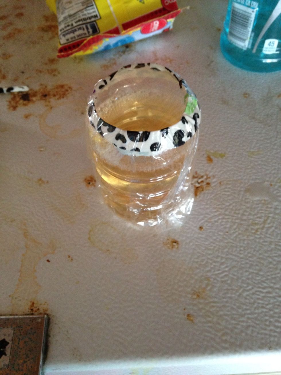 And put it over ur bottle to seal it off. It will NOT make it not spill, but It will help if it gets tipped over.