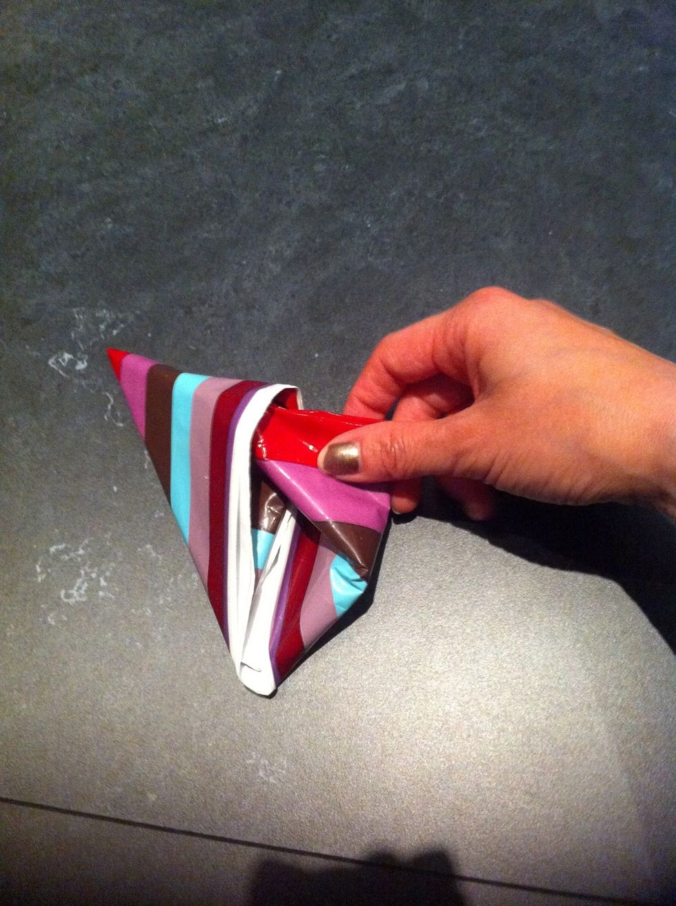 ...and put the righter side into the hole.