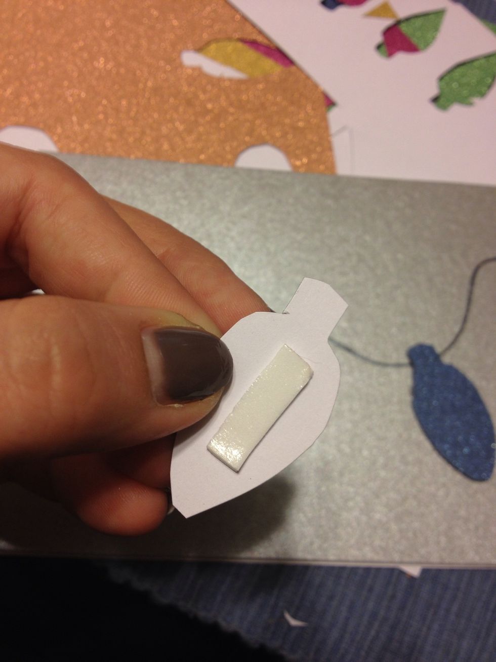 And repeat foam tape placement to your lightbulb cutouts.