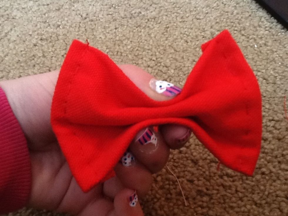 And repeat on the other side! You can use either of these rolling methods to shape your bow, I chose the fist way!