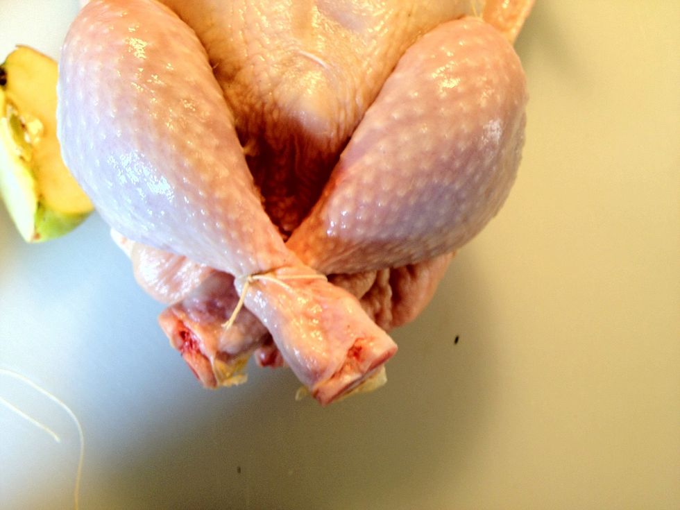 And round the end of the crossed chicken leg. This will keep your stuffing inside, and make it more juicy. Remove the string before serving.