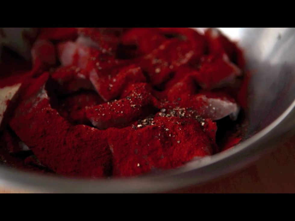 ... and rub them with paprika and salt.