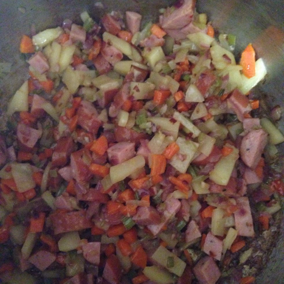 And sausage. Let cook for sometime.