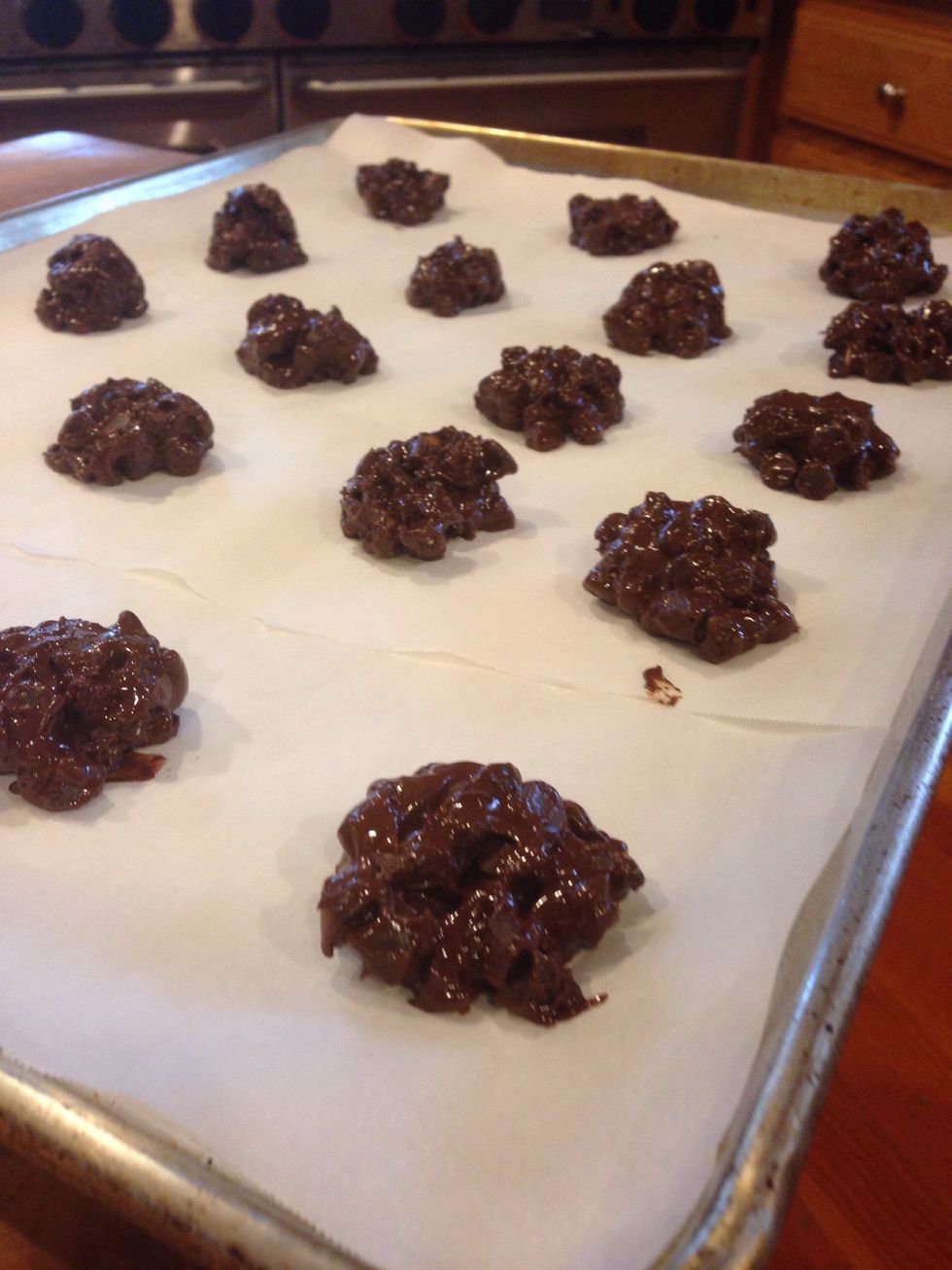 And scoop cookies into a parchment lined tray.