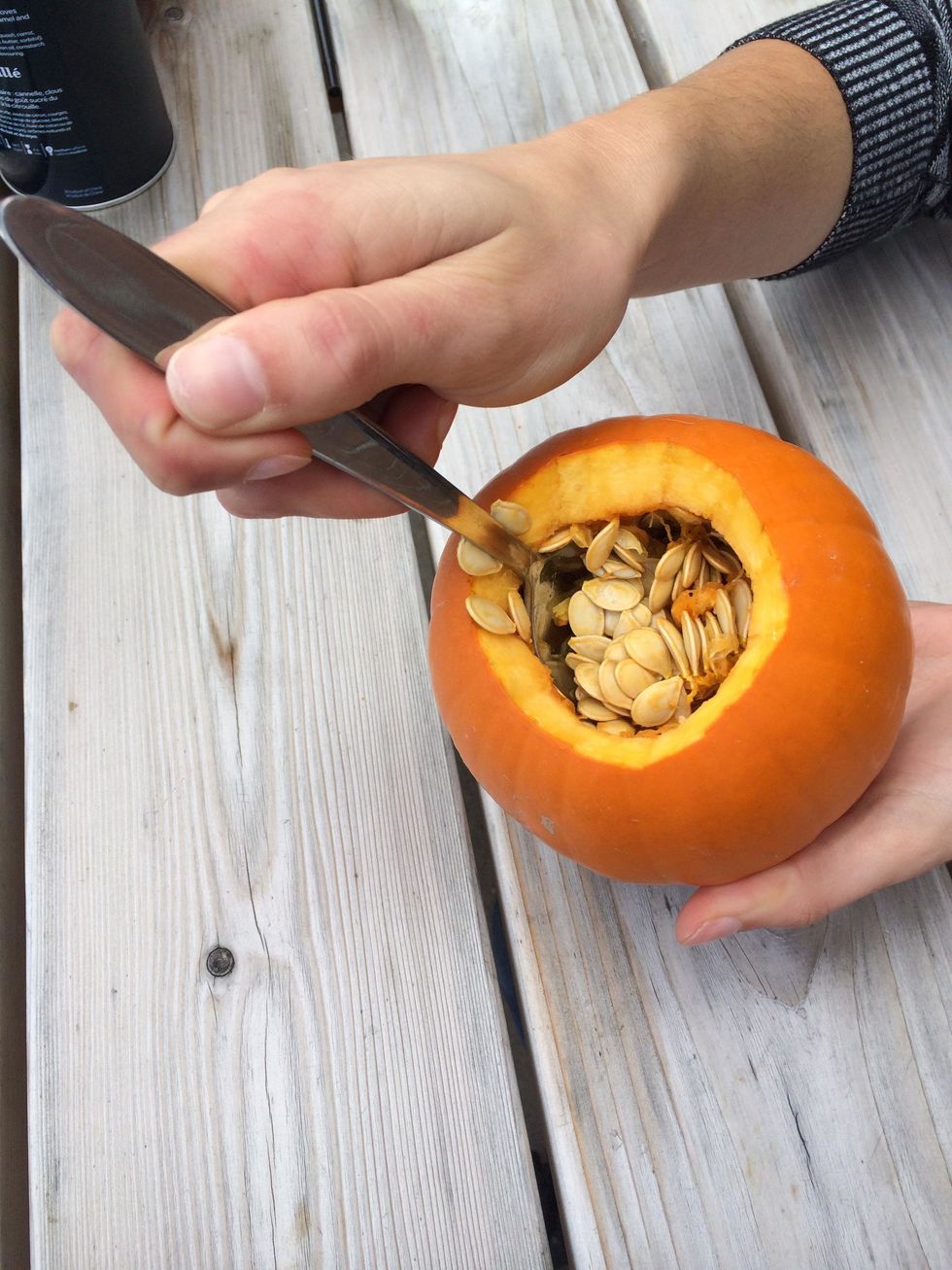 And scoop out the insides. Don't forget to save the seeds for baking!