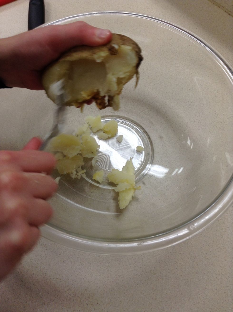 And scoop the inside of your potato into the bowl