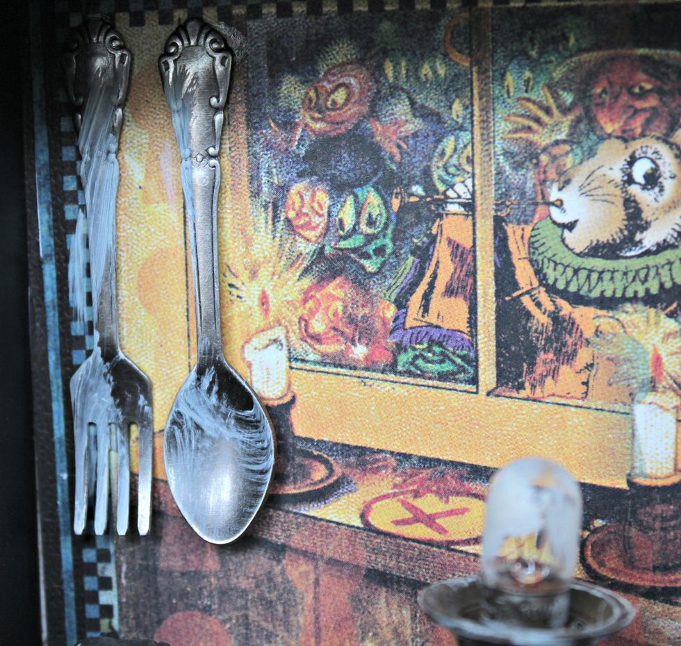 and silverware. Dry brush silverware, candle holder, and light bulb with Titan Buff paint.