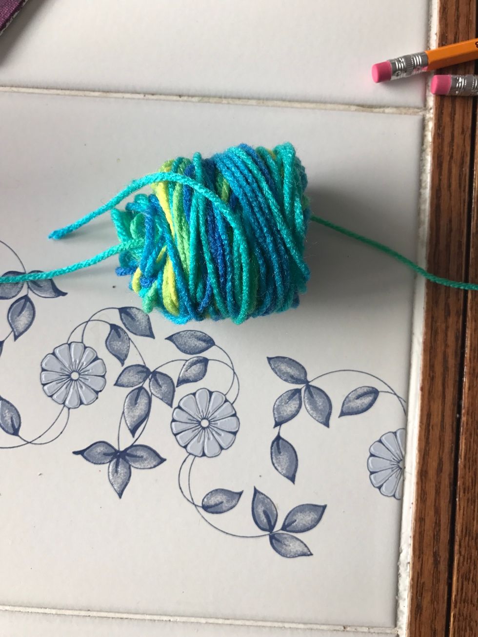 And slide it through all the yarn