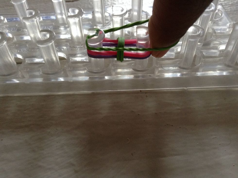 And so, you need to add on another rubber-band on top of the two rubber-bands you pushed down.