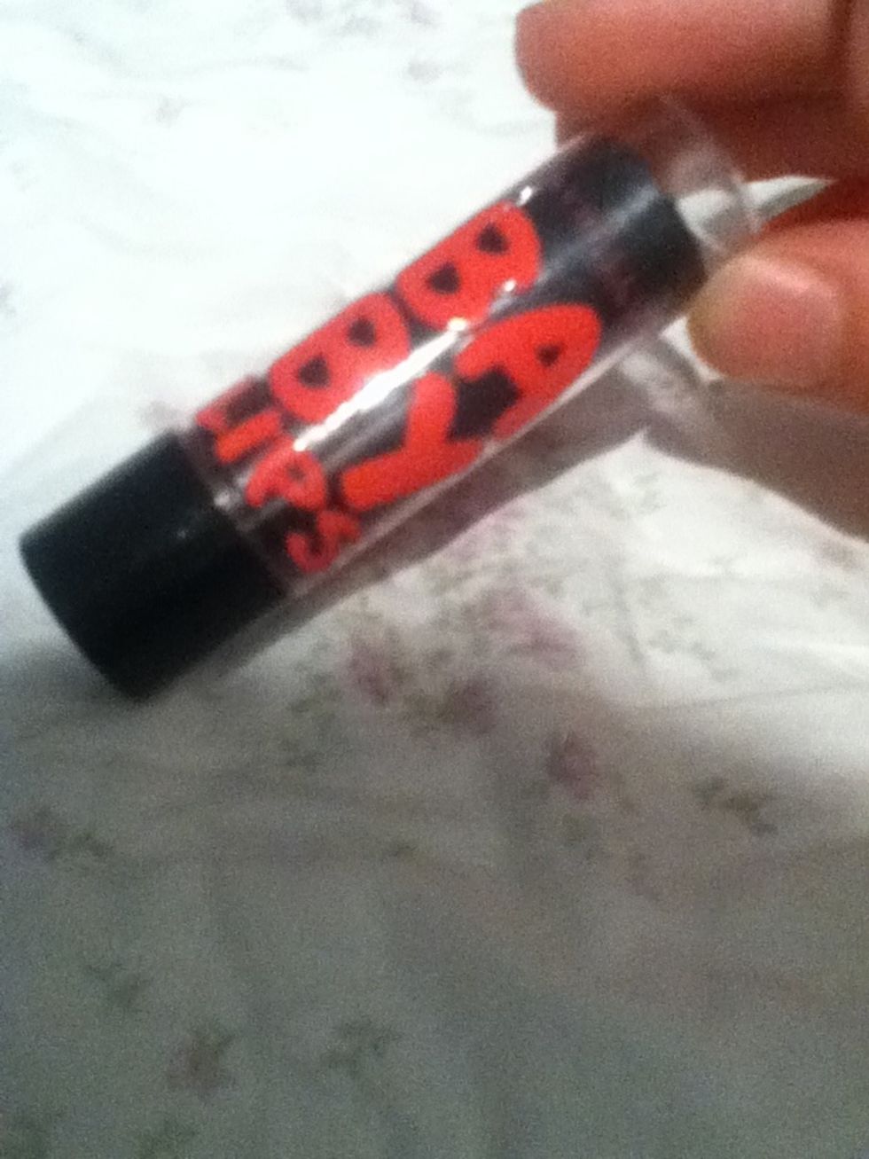 And some lip gloss. This is number 95 Strike a Rose from the Maybelline Baby Lips collection.