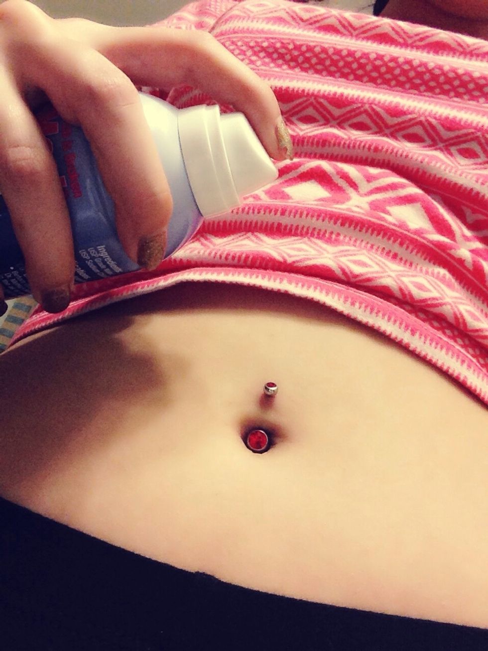 And spray the saline spray on your belly button with the other !