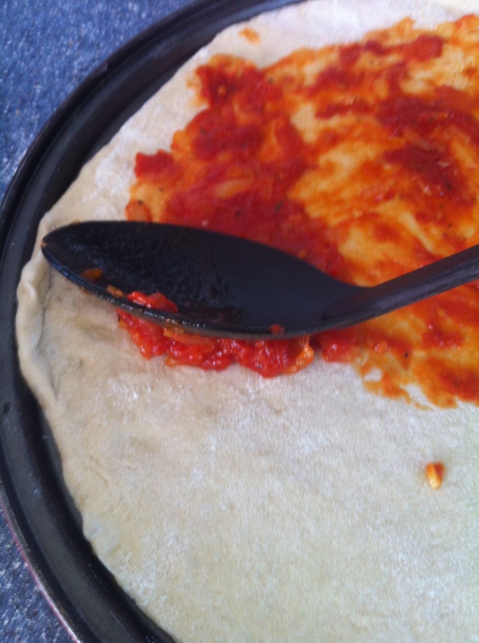 ...and spread out evenly with the back of a rounded serving spoon