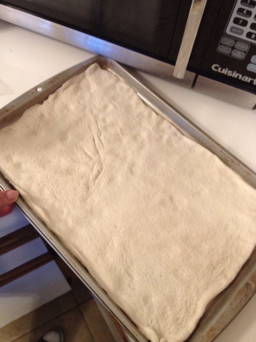 And spread to all corners making sure dough is even. Can bunch up in the corners