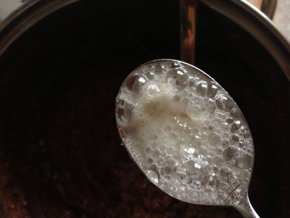 And sprinkle a lemon juice over soda so it bubbles like that, then it all bubbled through, add it to the dough and mix thoroughly