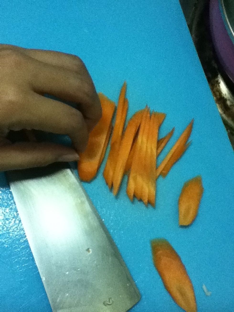 And stack sliced carrots and cut thin like this.