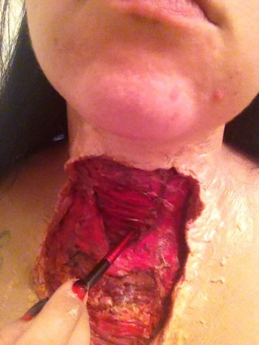 And start to create definition and more depth. Go around the inside of the flaps of skin and the outline of the muscles.