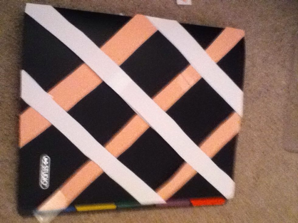 And stick it down!! Do the same for both colours just change the direction they're facing! Then cut the edges sticking out off!