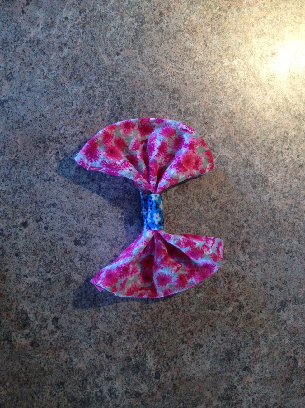 And take a little piece of some other fabric, to hold the bow together.