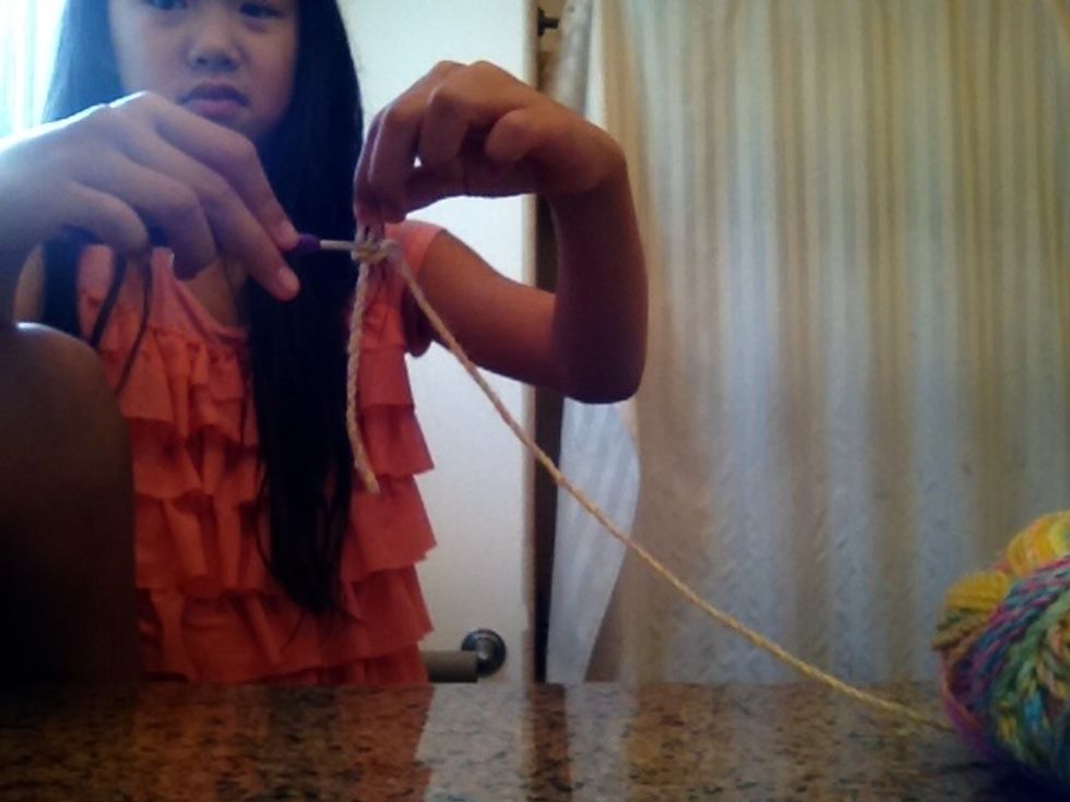 And take your hoop and pull it around the hook
