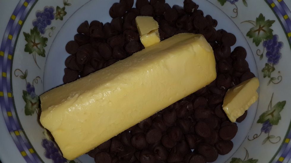 And the butter with the chocolate until they melt. You can do this in the microwave or the stove, I recommend the stove so you can keep an eye on it \ud83d\ude09