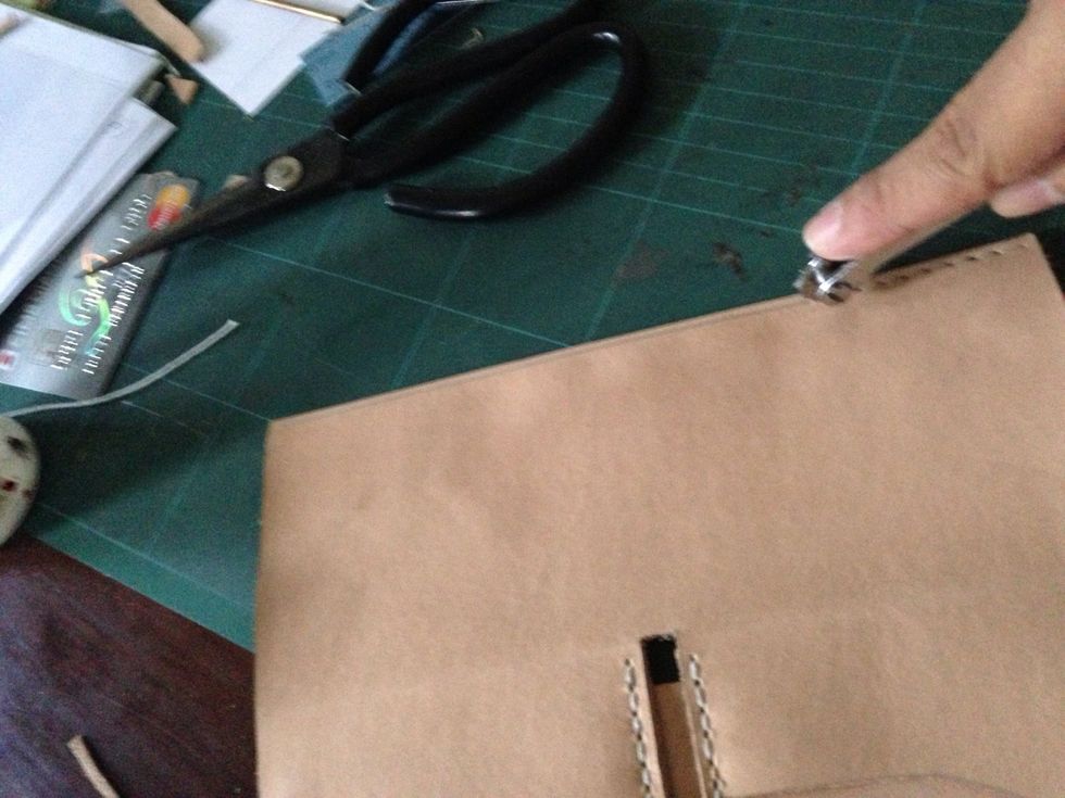 And then do the same method on the flap we made before