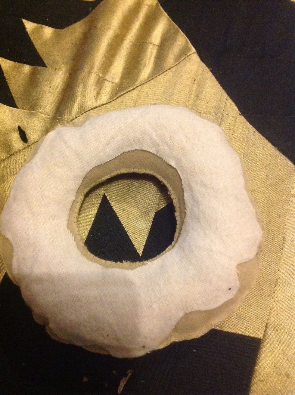 And then I took another lilac fleece fabric and cut it like this for the icing and glued it down.