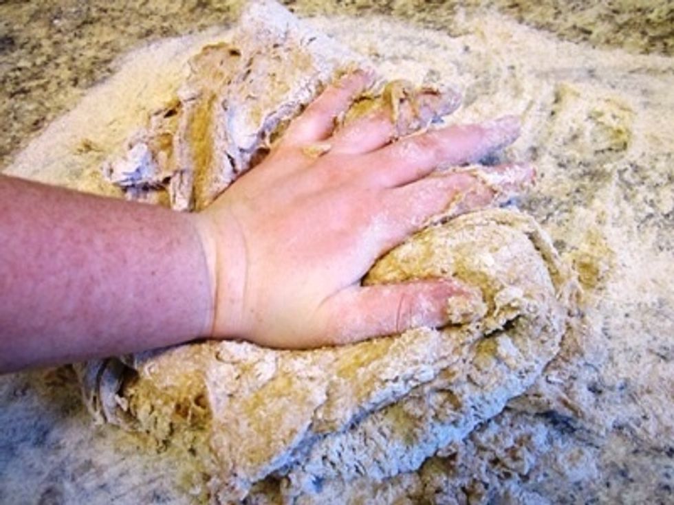 ...And then press down on the center to squish it all together. Knead the dough for about 8 minutes. Usually I use two hands, but I didn't really want to get my camera messy.