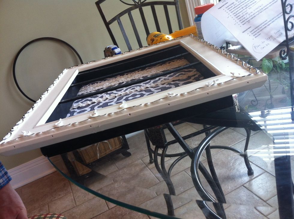 And then with a small drill, drill little holes for the hooks to go in