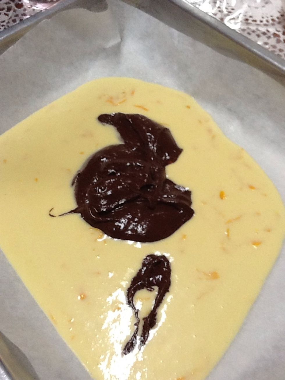 And then you have to pour the cocoa mix into the pan with the orange zest and juice.
