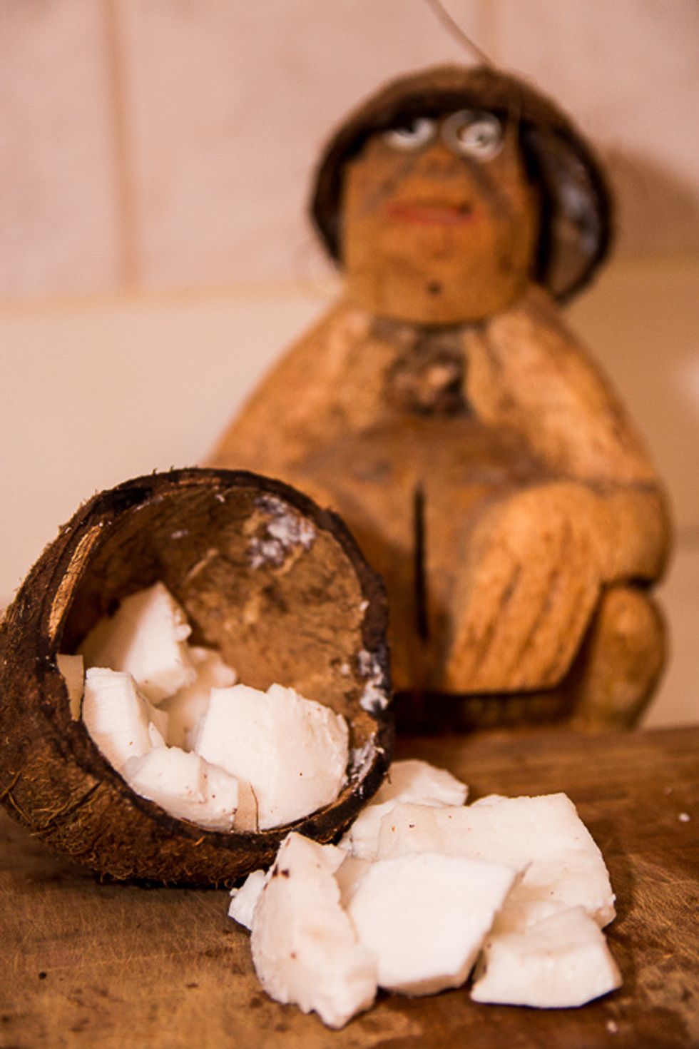 And there ya have it. Fresh coconut ready for grating, slicing, toasting and crafting. Bonus new hat for the coconut dude in the background.