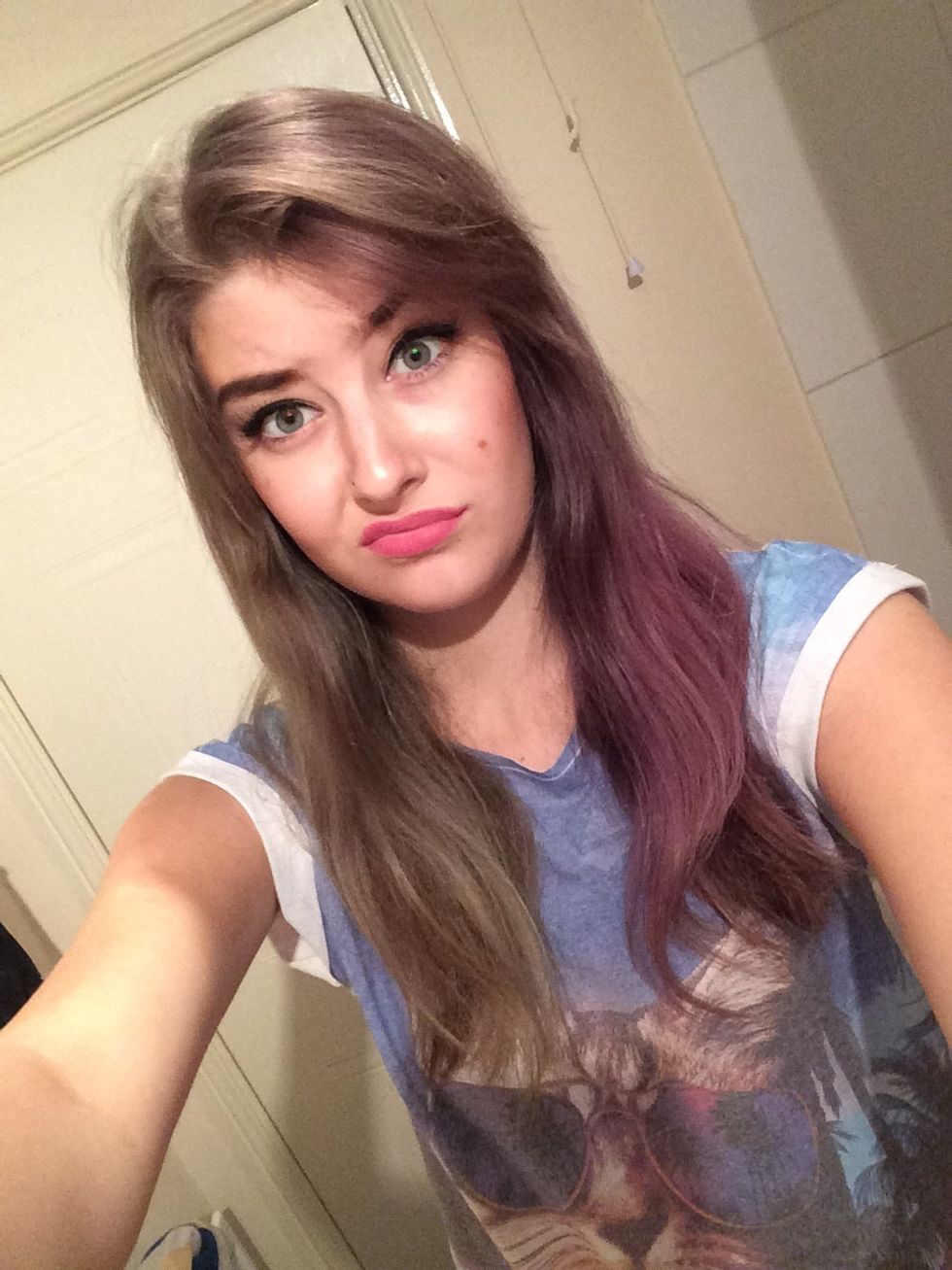 And this is what it looks like now... A faded mess! So it's time to remove the dye. I don't mind faded purple, but faded green isn't the most flattering hair colour!