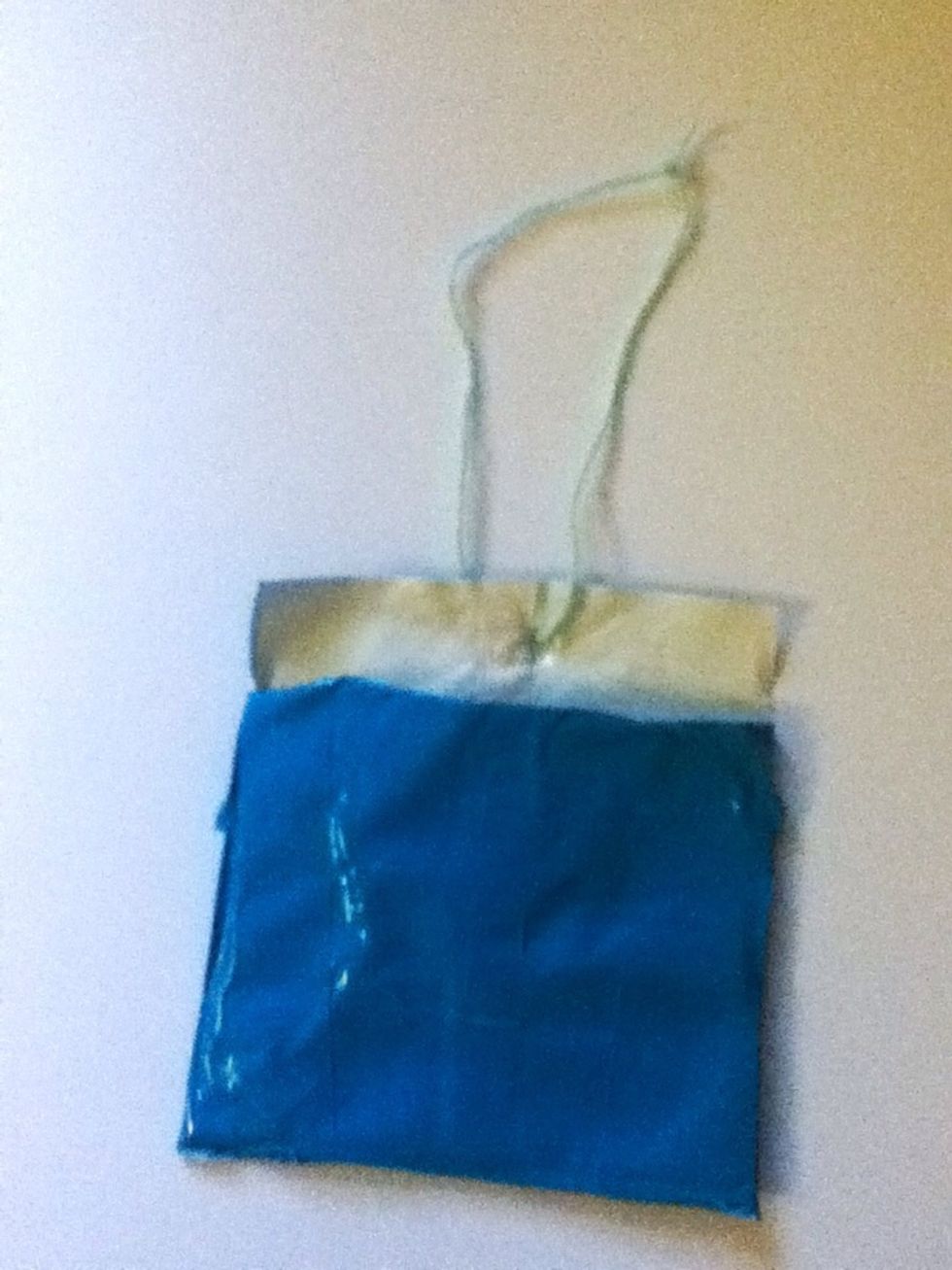 ...and tie the string through it.