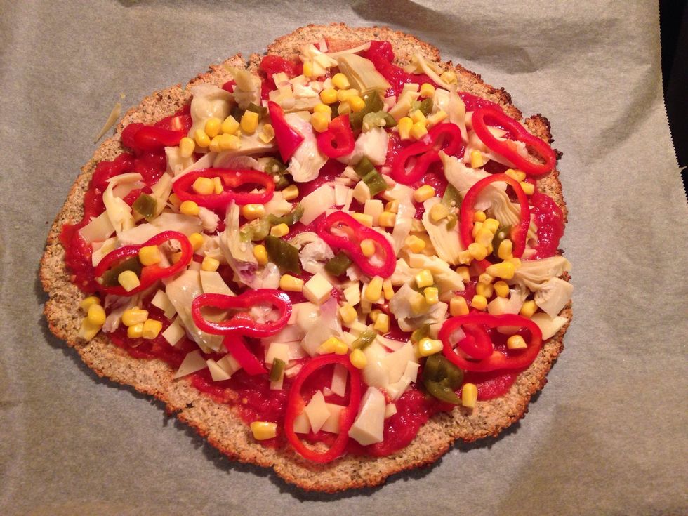 ...and toppings of choice. I used gouda cheese, red bell pepper, artichockes, corn and jalape\u00f1os. Season with oregano and bake for another 8-10 minutes.